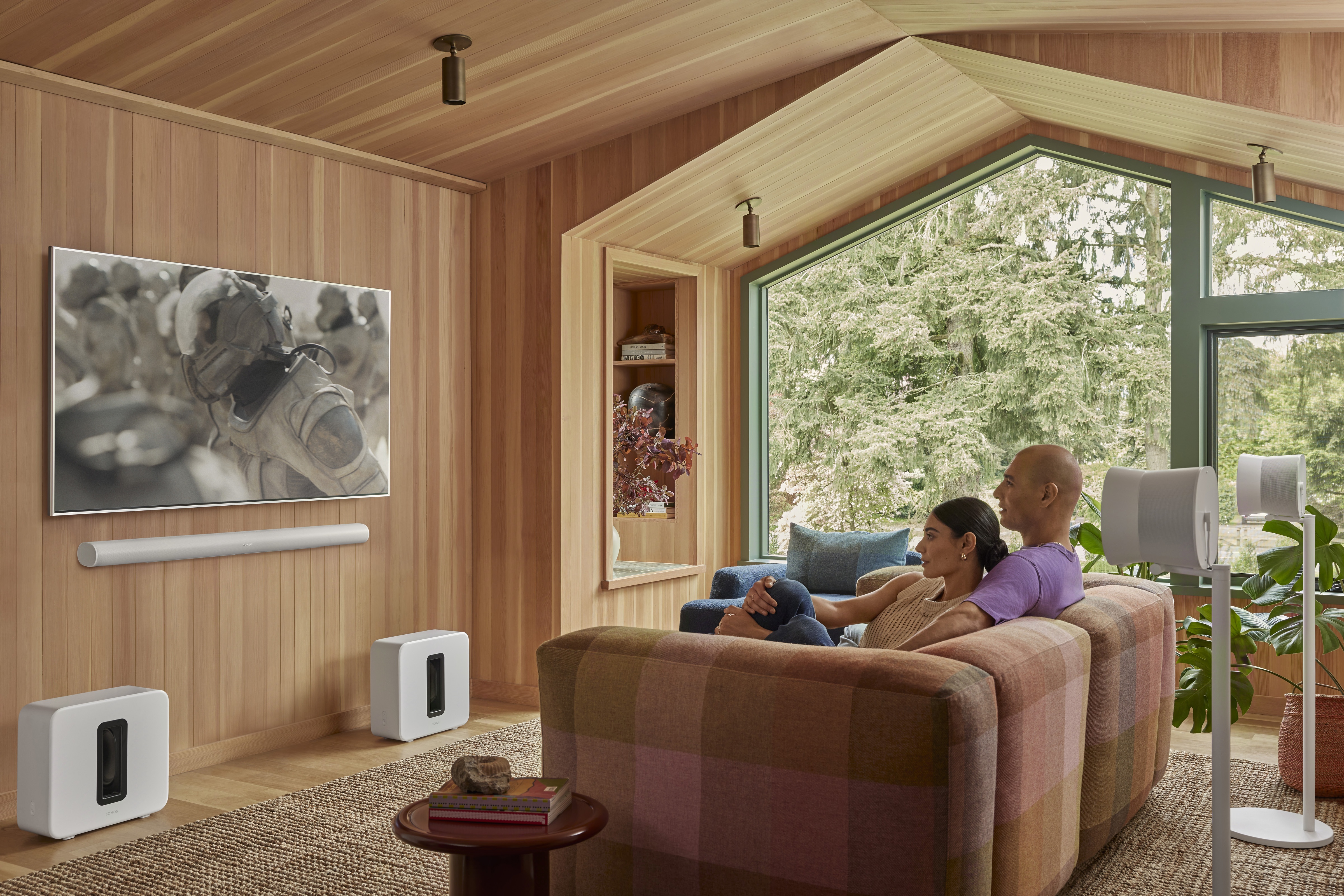 Open-plan space with Sonos speakers positioned for even coverage